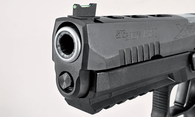  The front sight is a Dawson Precision fiber optic, and the slide-to-barrel fit is as tight as you’d find on a custom 1911—even though the X-Five is an assembly-line gun.