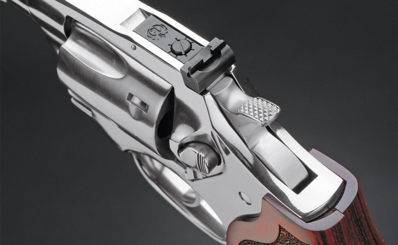 The Match Champion features an adjustable rear sight and a serrated hammer spur. The front of the cylinder has a slight taper for easy holstering.
